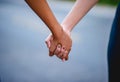 Holding hands with each other is an expression of love. Love concept Royalty Free Stock Photo