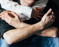 Holding hands. Lovers couple holding hands in a room. Hand in hand. hug Royalty Free Stock Photo