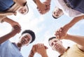 Holding hands, prayer circle and business people with support, faith and diversity in low angle by sky. Men, woman and