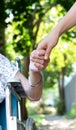 Holding hands with senior lady Royalty Free Stock Photo