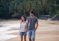 Holding hands, walking and couple on beach for vacation, adventure or holiday for tropical travel. Nature, love and Royalty Free Stock Photo