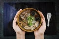 Holding Hot Omelet Soup with Minced Pork, Thai style food, selective focus and with a very shallow depth of field, copy space toph Royalty Free Stock Photo