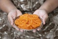 Holding Jalebi and Indian sweet in a steel plate, Satara