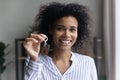 Portrait of young black female broker realty buyer holding keys