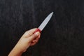 Holding Knife in The Dark Royalty Free Stock Photo