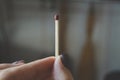 Holding Match in female hand Royalty Free Stock Photo