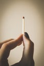 Holding Match in female hand Royalty Free Stock Photo