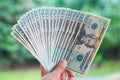 Holding money twenty American dollars in hand Royalty Free Stock Photo