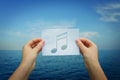 Holding music note Royalty Free Stock Photo