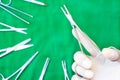 holding a needle holder on sterile drape