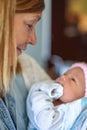 Holding newborn baby girl in hospital