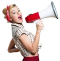 Portrait of woman holding megaphone, dressed in Royalty Free Stock Photo