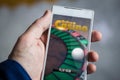 holding online casino smartphone