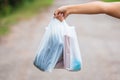 Holding Plastic Bags Royalty Free Stock Photo