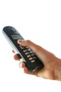 Holding portable telephone handset Royalty Free Stock Photo