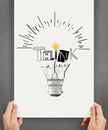Holding poster show hand drawn light bulb Royalty Free Stock Photo