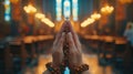 and holding rosary against cross and praying to God at church. Royalty Free Stock Photo