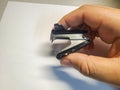 holding a staple remover