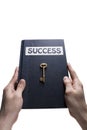 Holding success key book Royalty Free Stock Photo
