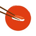 Holding sushi with salmon with chopsticks Royalty Free Stock Photo