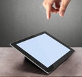 Holding touch screen tablet Royalty Free Stock Photo