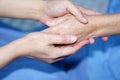 Holding Touching hands Asian senior or elderly old lady woman patient with love, care, helping, encourage and empathy.