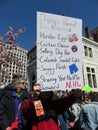 Holding up the Protest Sign