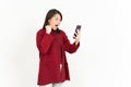 Holding and Using Smartphone Of Beautiful Asian Woman Wearing Red Shirt Isolated On White Royalty Free Stock Photo