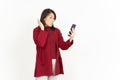 Holding and Using Smartphone Of Beautiful Asian Woman Wearing Red Shirt Isolated On White Royalty Free Stock Photo