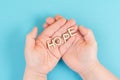 Holding the word hope in the palm of the hands, trust and believe concept, having faith in the future, hopeful positive mindset Royalty Free Stock Photo