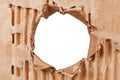 Hole in cardboard. A torn piece of cardboard or paper. Blank space for text Royalty Free Stock Photo