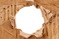 Hole in cardboard. A torn piece of cardboard or paper. Blank space for text Royalty Free Stock Photo