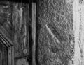 Hole carved into a stone door post where a Mezuzah small scroll containing a prayer was once placed, Krakow, Poland