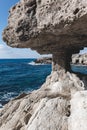 Hole in a cave with a beautiful view on sea near cape Greco in national park Royalty Free Stock Photo