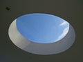 Hole in the ceiling with a blue sky. Royalty Free Stock Photo