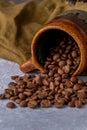 Hole coffee beans in a ceramic cup Royalty Free Stock Photo