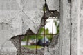 Hole in a concrete wall Royalty Free Stock Photo