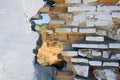 Hole in the different structured wall Royalty Free Stock Photo