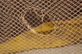 Hole in a fishing net Royalty Free Stock Photo