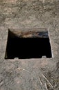 Hole in floor of old house leading to cellar Royalty Free Stock Photo