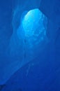 Hole in a glacier viewed from inside Royalty Free Stock Photo