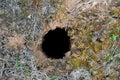 Hole in the ground Royalty Free Stock Photo