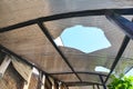 Hole in the House Polycarbonate Sheeting. Roof Polycarbonate Sheets Royalty Free Stock Photo