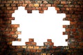 Hole in an old brick wall - with clipping path Royalty Free Stock Photo