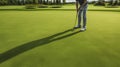 Hole-in-One Hope - Golf player at the putting green. Hitting ball into a hole. Generative AI Royalty Free Stock Photo