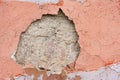 Hole in the place of the disappeared layer of plaster