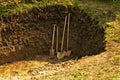 Hole with shovel,spade and hoe Royalty Free Stock Photo