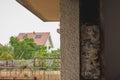 Hole in a window as the old windows were removed and the gap is ready to be closed with installation of new modern windows. House Royalty Free Stock Photo