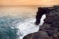 Holei Sea Arch at sunset. Natural arch is located at the end of the Chain of Craters Road in the Volcanoes National Park on the Bi Royalty Free Stock Photo