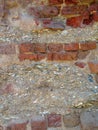 Holes in brick fort wall filled with tabby